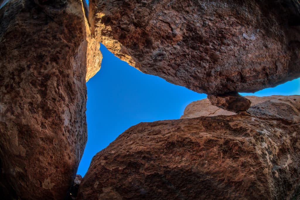 A view taken from one of the "streets," looking up through the eroded pinnacles in City of Rocks State Park, New Mexico.