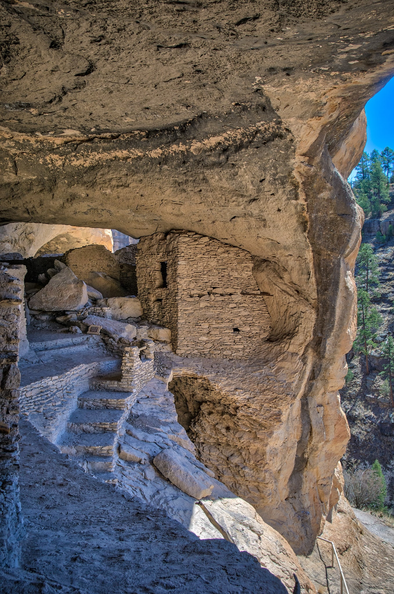 This is a view from within the Gila Cliff Dwellings looking out to the canyon beyond.