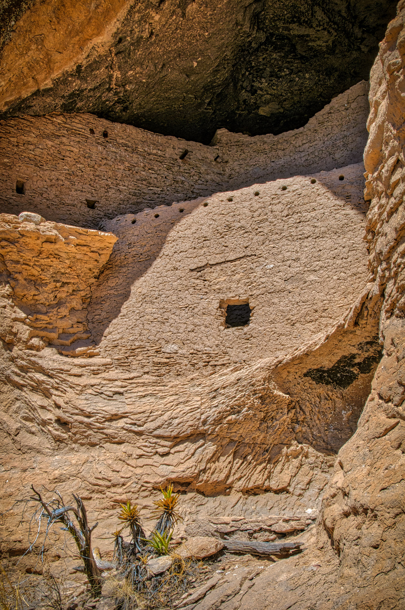 This close-up of Mogollon stone masonry highlights the technical expertise of these ancient builders in integrating their structures into the country rock at Gila Cliff Dwellings National Monument.