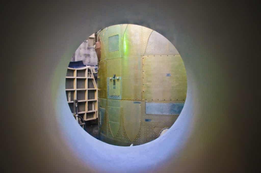 Porthole view of the side of a Titan II missle in its silo at the Titan Missle Museum, south of Tucson, Arizona.