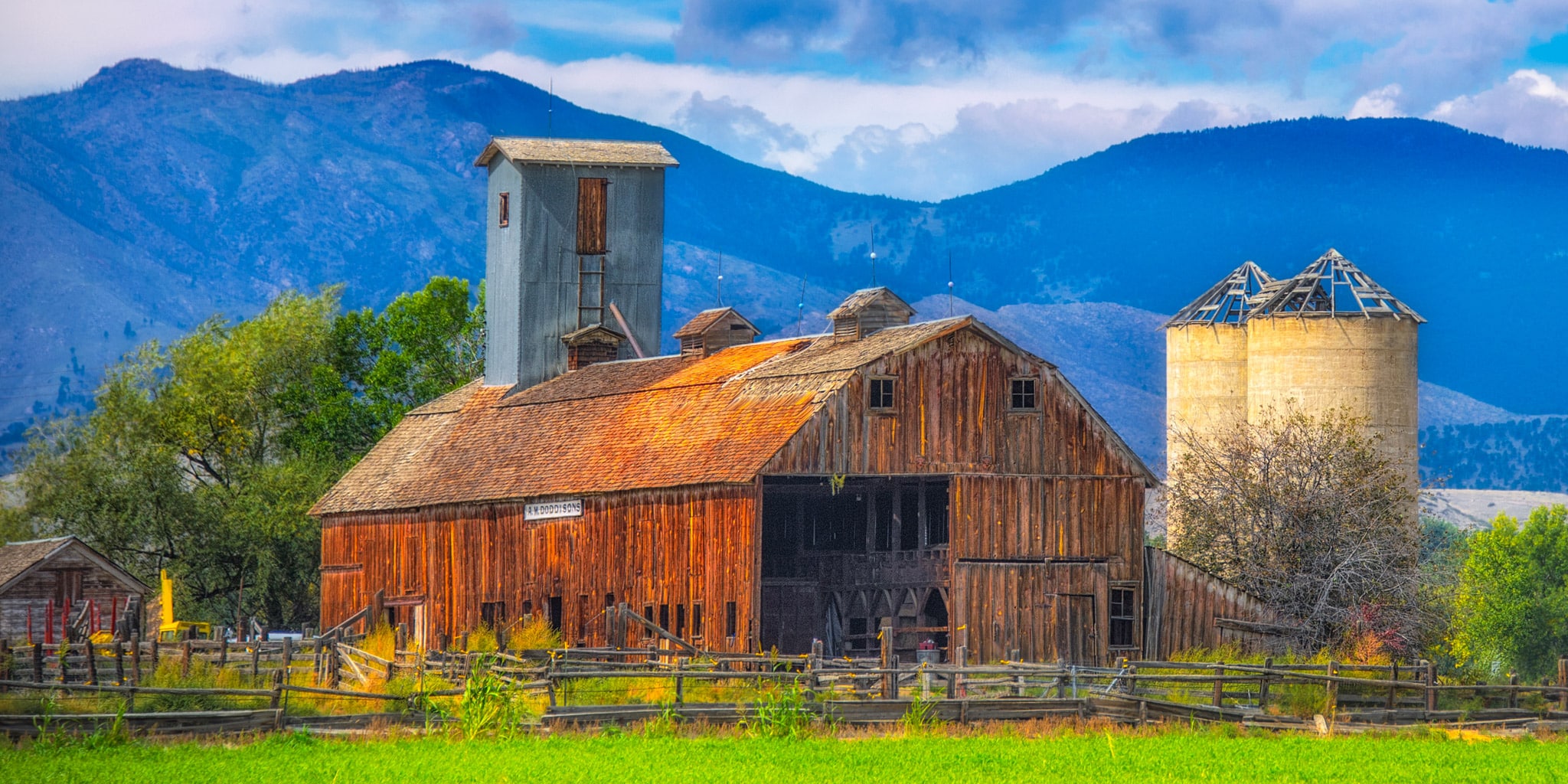 This old barn with solos and elevator is located on Niwot Road off the Diagonal Highway in Boulder, Colorado.
