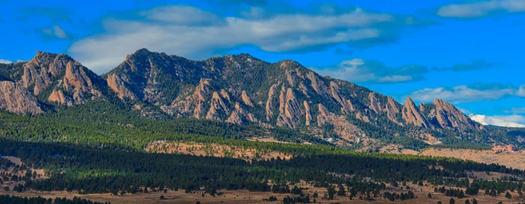 This panoramic view of the Flatirons on the western edge of Boulder, Colorado, was taken from US 36.