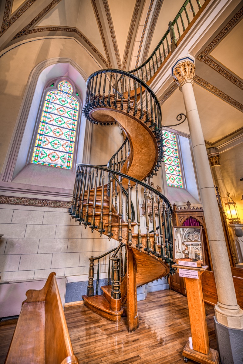 The Loretto Chapel is most famous for its spiral staircase. Many believers consider these spiral stairs to be miraculous; because, it is believed that they were constructed without the use of nails, glue or central support.