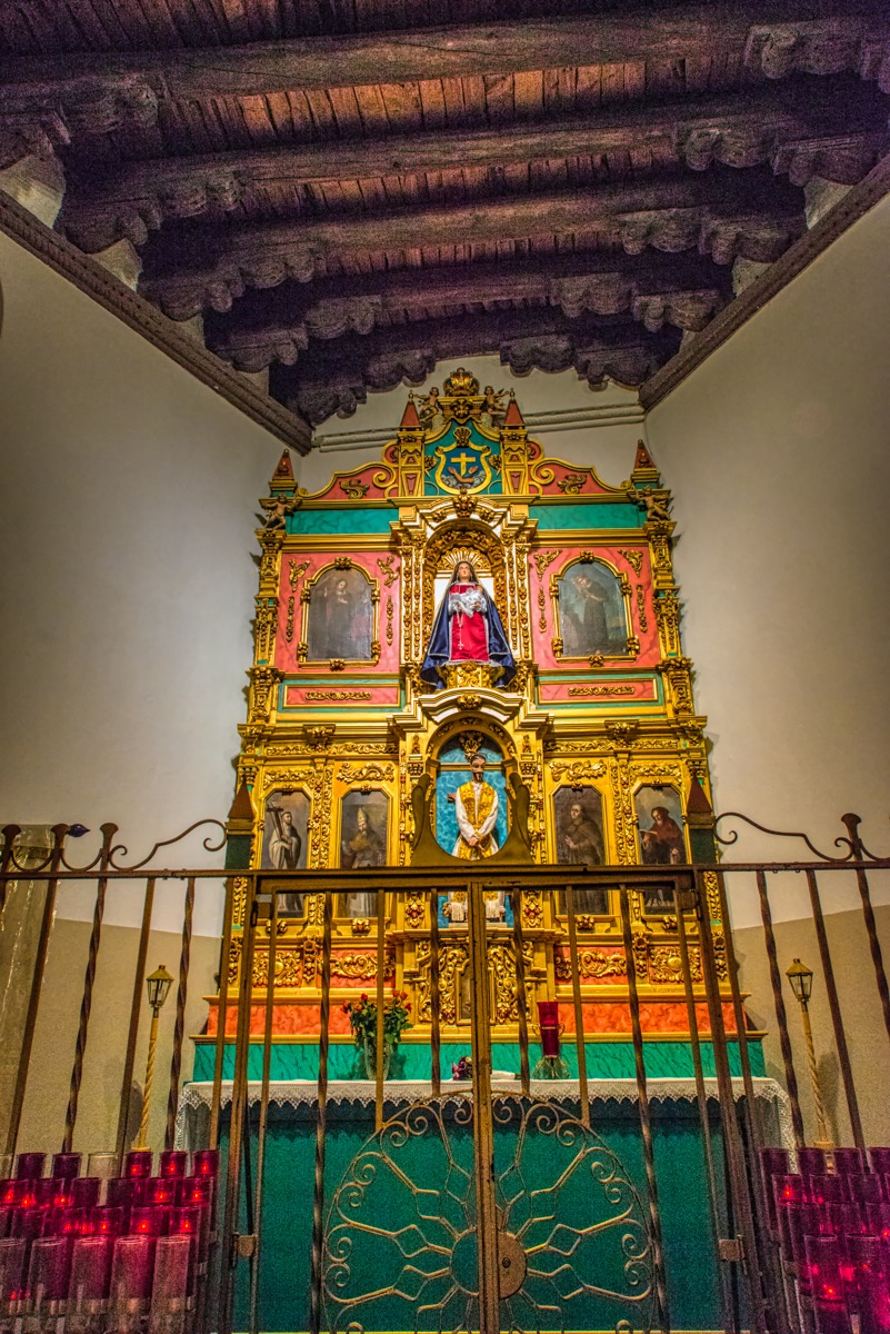 The Conquistadora Chapel, located to the left of the high altar, shows elements from La Parroquia. La Parroquia was built around 1714. The altar screen, or reredos, contains paintings brought from Spain in the 1700's. The staue of Our Lady of the Rosary, renamed La Conquistadora, dates from 1626 and the first church built on this site. This makes her the oldest Madonna in the United States. Below the Madonna is a representation of Christ wearing the Crown of Thorns, with a cross behind Him.