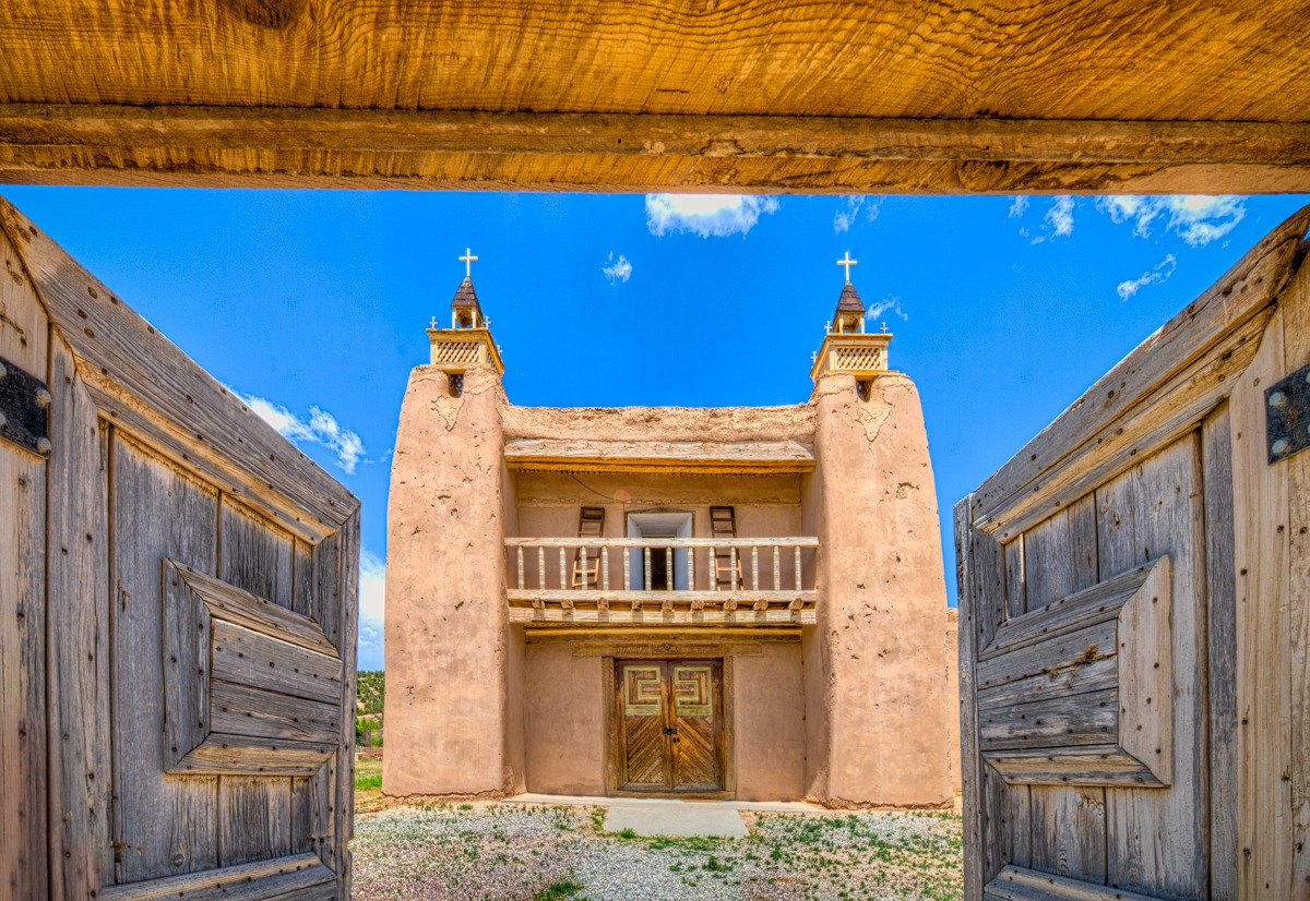 A view through the arched gateway at the front facade of the San Jose de Gracia church. The San Jose de Gracia Church, also known as Church of Santo Tomas Del Rio de Las Trampas, is a historic church on the main plaza of Las Trampas, New Mexico.