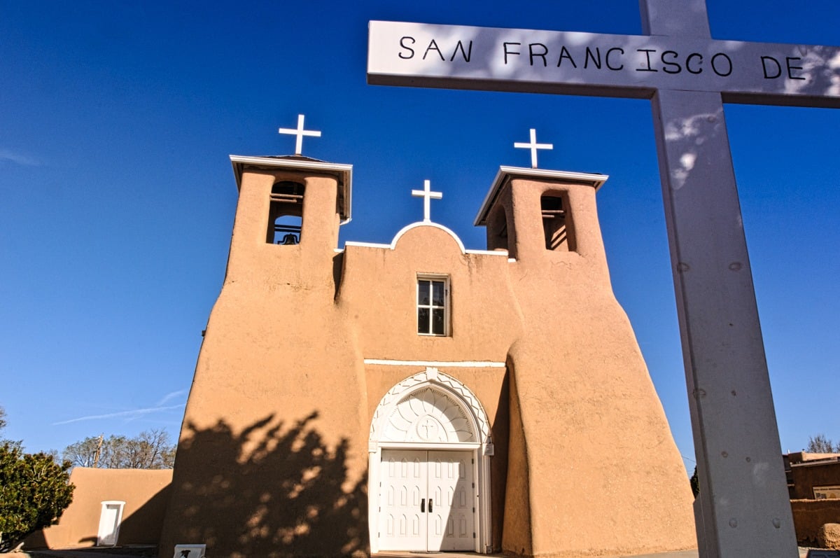 This is the front view of San Francisco de Asis Mission Church taken early on a late March morning. The church is located in Ranchos de Taos, New Mexico.