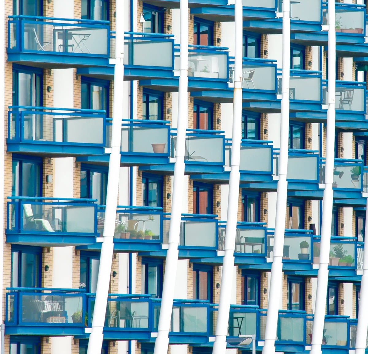 This is a detail of an apartment building along the Thames River taken from a ferry near South Dock Marina. This image is part of our London architectural abstracts portfolio.