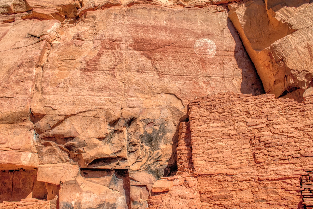 Closeup of ancient Sinaguan pictographs and ruins at Honanki Heritage Site, near Sedona, Arizona. Is that a moon figure above the wall?