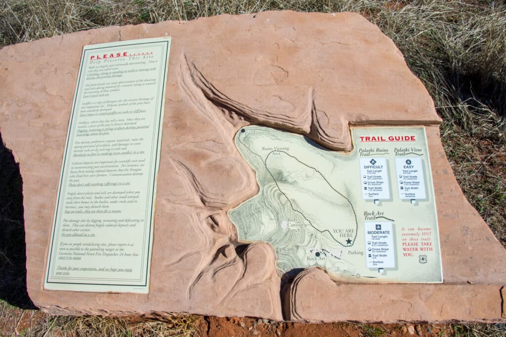 Closeup of the trail guide sign near the parking lot of Palatki Heritage Site, near Sedona, Arizona.