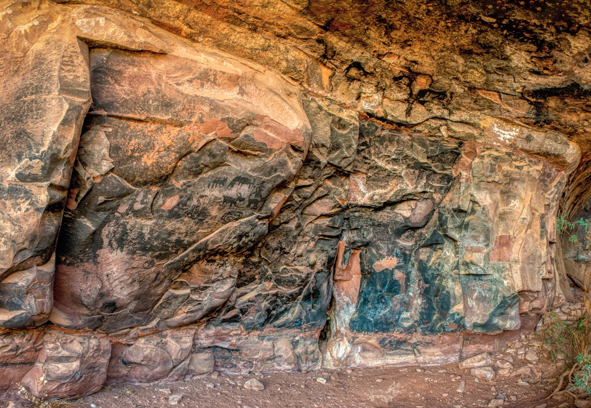 A grouping of pictographs on a soot-covered cave wallat Palatki Heritage Site near Sedona, Arizona.