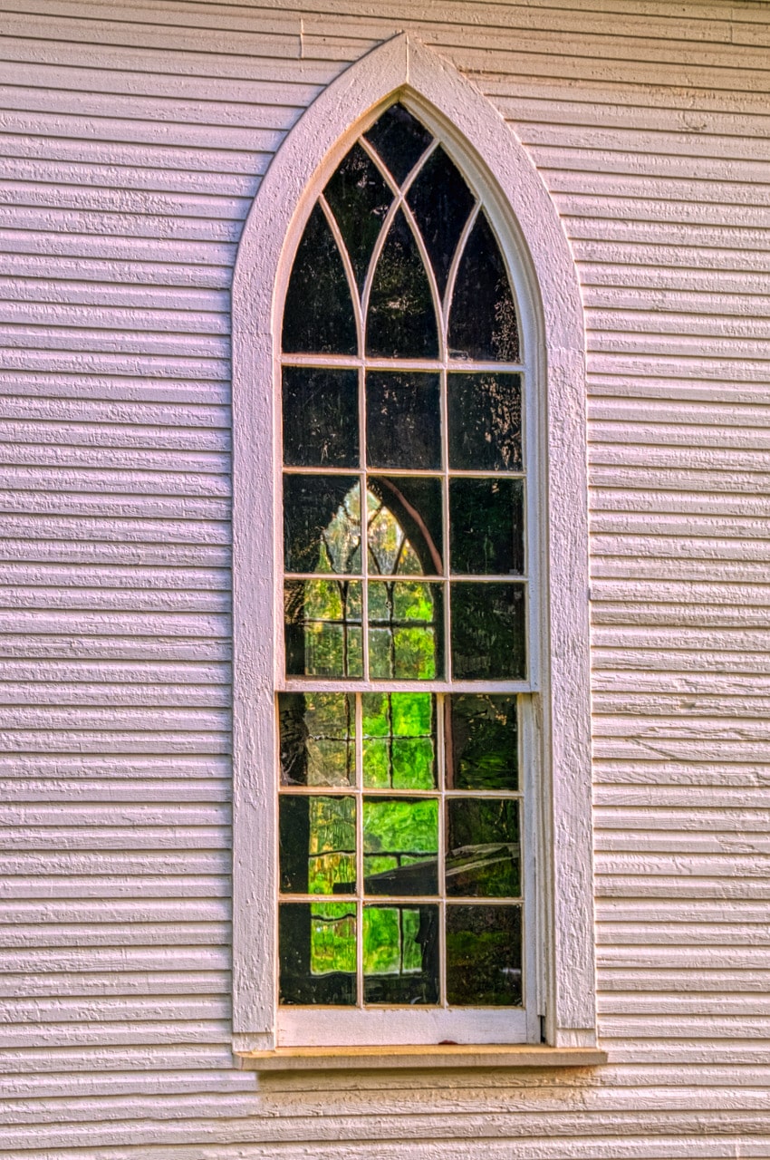 A view through a window on the west side of St. Mary's church to a window on the east side of the church.