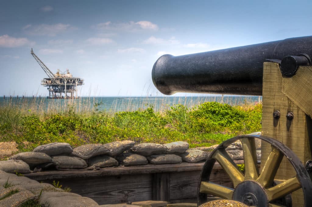 A canon at Ft. Morgan, on Alabama's Gulf Coast, appears to be aimed at an off-shore drilling platform.
