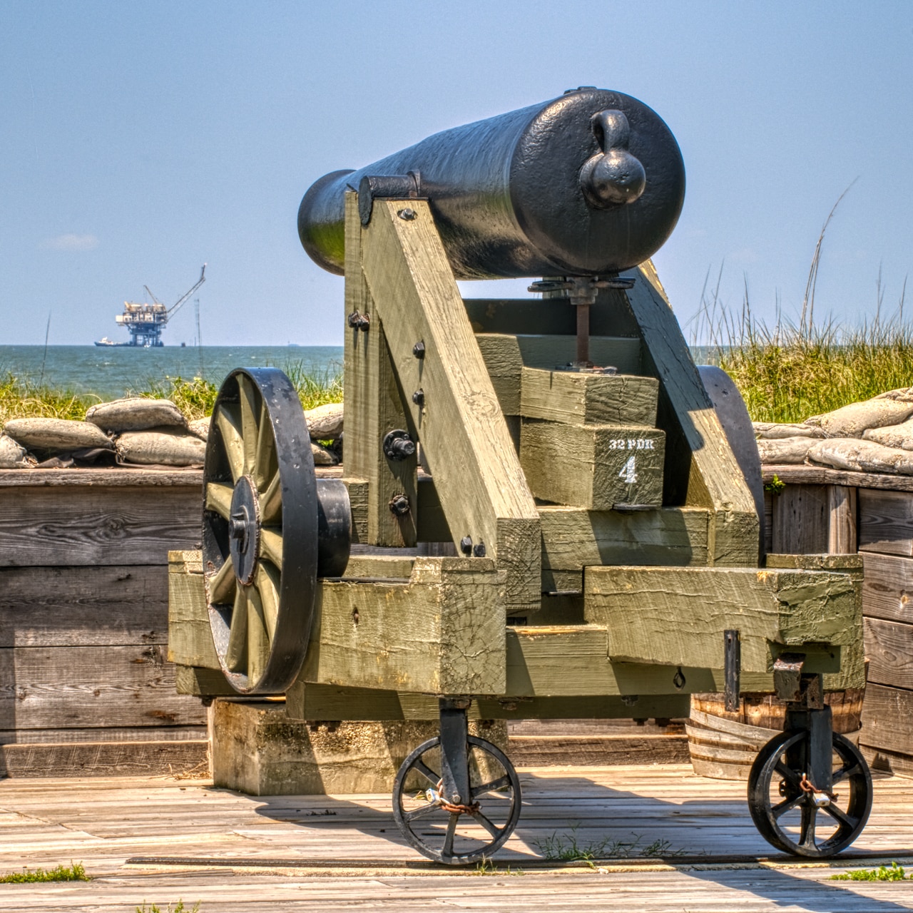 A cannon at Ft. Morgan, on Alabama's Gulf Coast, appears to be aimed at an off-shore drilling platform.