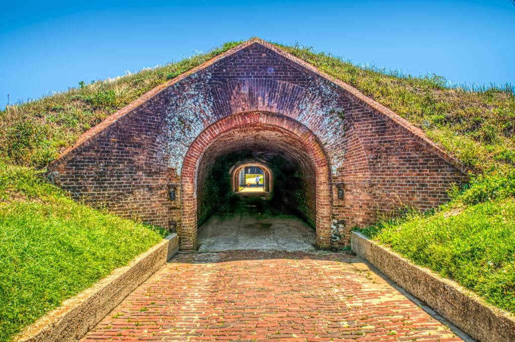 Entering Fort Morgan's sally port from Fort Morgan Road. Fort Morgan lies on the tip of Mobile Point, guarding the entrance to Mobile Bay.