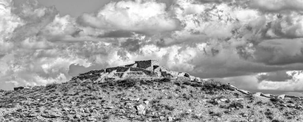 The ruins of a Sinaguan three-story pueblo run along a outcropping in the Verde Valley near Clarkdale, Arizona. The site is the main feature of Tuzigoot National Monument.