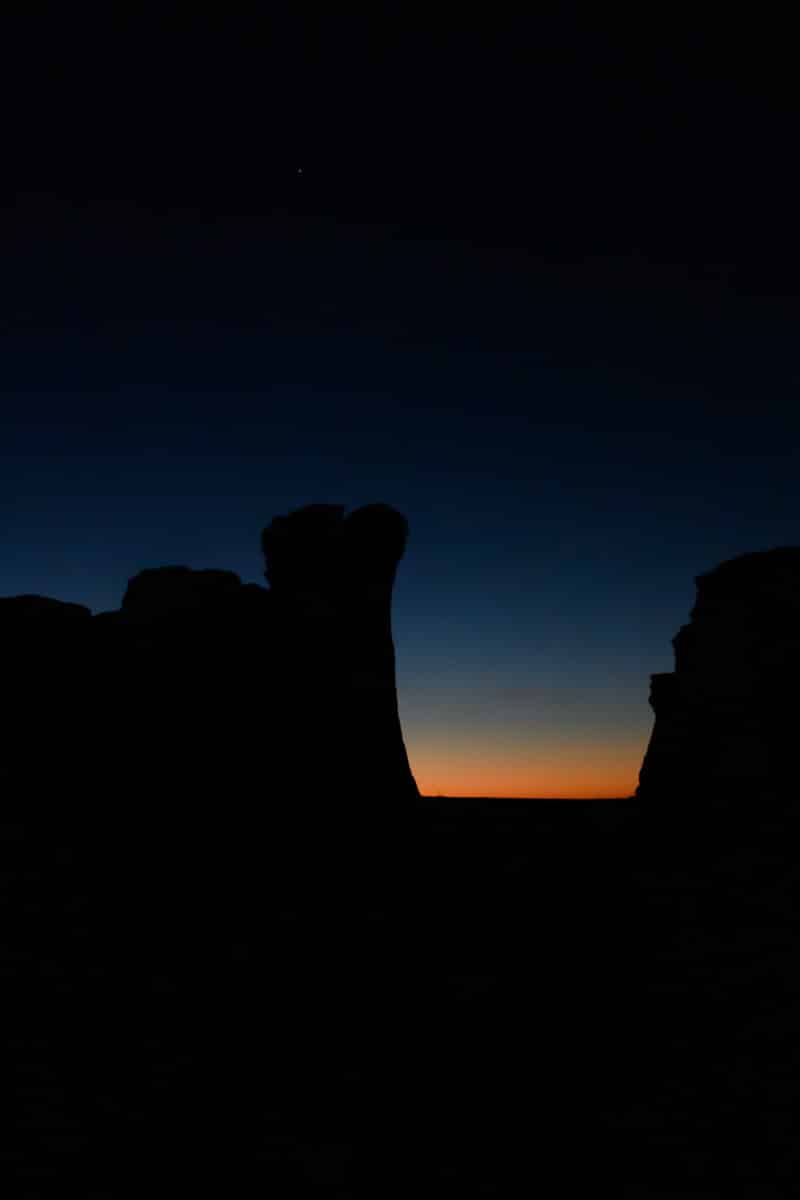A view of first light between two formation at Monument Rocks, near Oakley, KS.