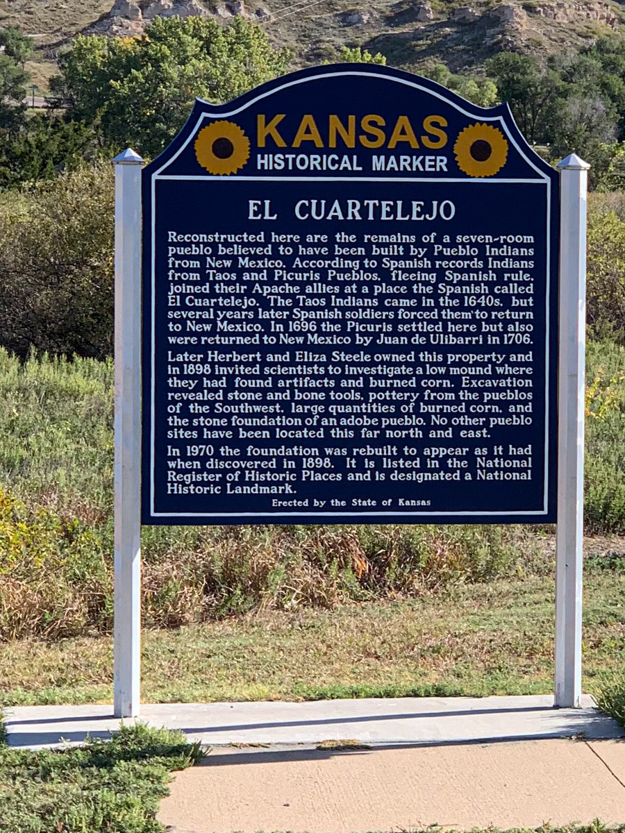 This historic marker provides a brief history of El Cuartelejo pueblos, which was built by refugees of the Taos Pueblo in New Mexico. It is located in Lake Scott State Park, Kansas.