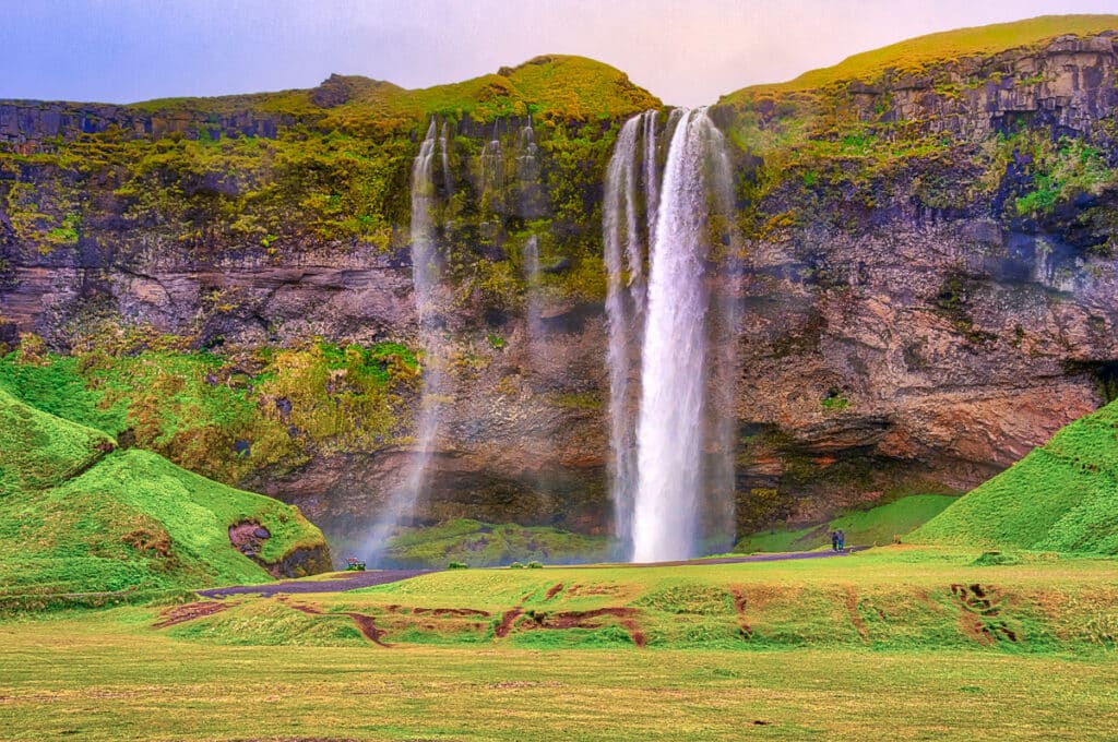 This is a wide view of Seljalandsfoss, taken from near the parking lot. The waterfall is in southern Iceland, just off the Ring Road.