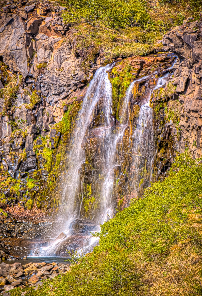 This unnamed cascading waterfall is along the trail to Sjónarnípa in Skaftafell, which is part of Vatnajokull National Park in Iceland.