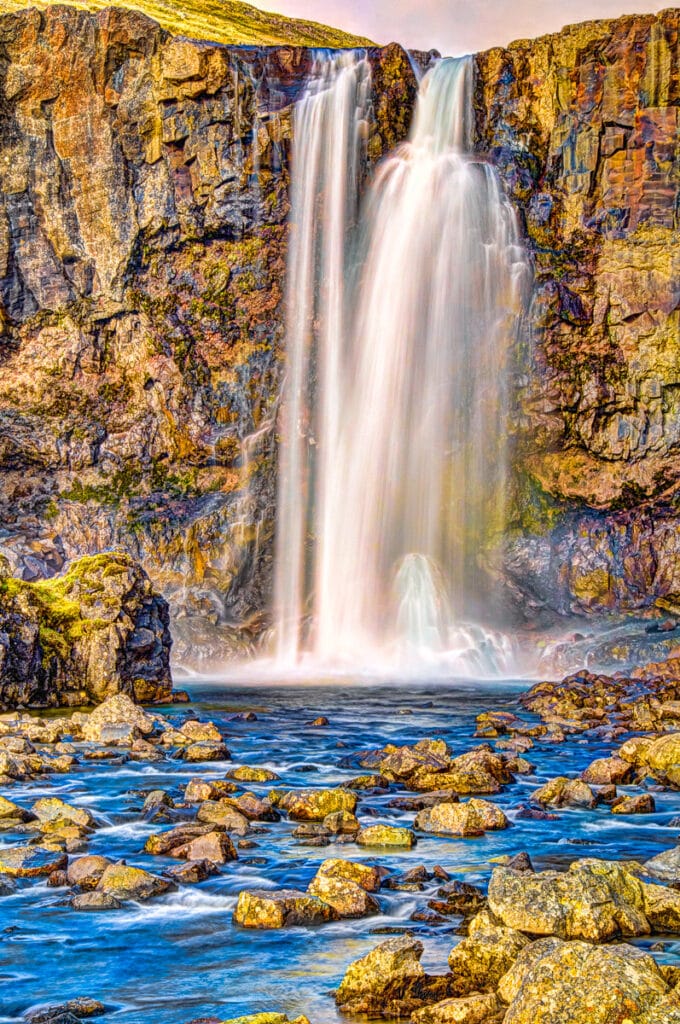 Gufufoss is a multi-level cascading waterfall, located just outside of the city of Egilsstaðir along the road leading to Seyðisfjörður. It flows into the Miðhúsaá River.