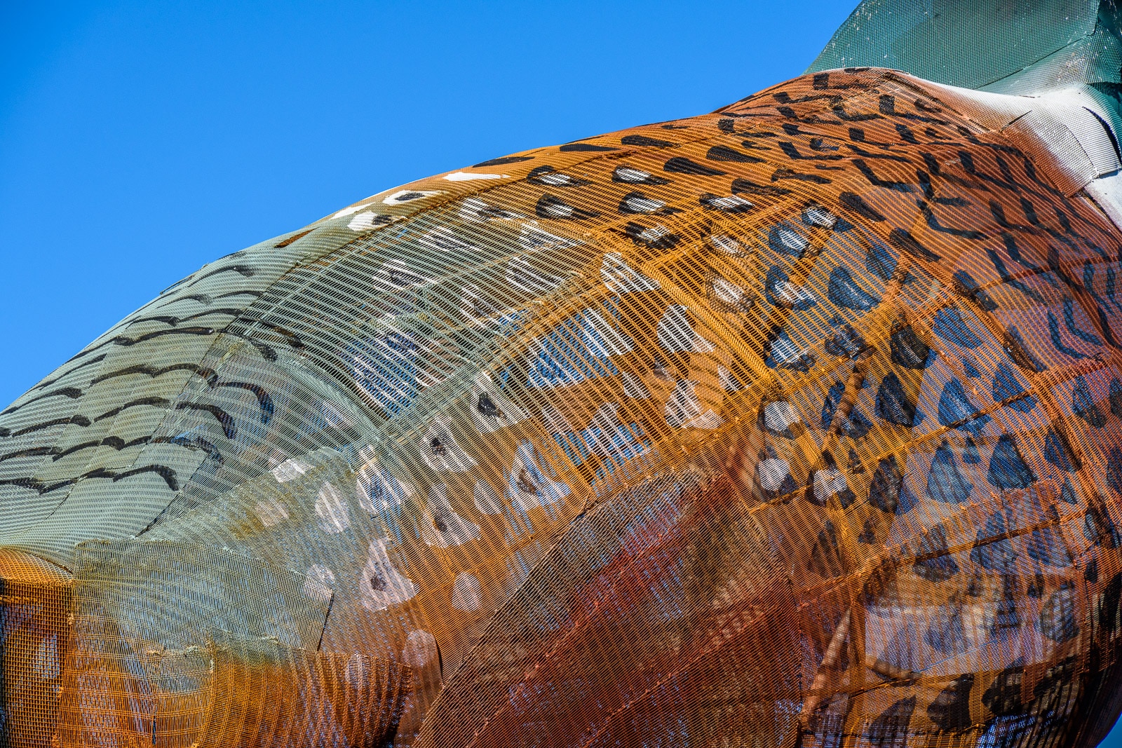 This is a detail of the back feathers on the male pheasant in the sculpture by Gary Greff called Pheasants on the Prairie, located along the Enchanted Highway running between I-94 and Regent, North Dakota.