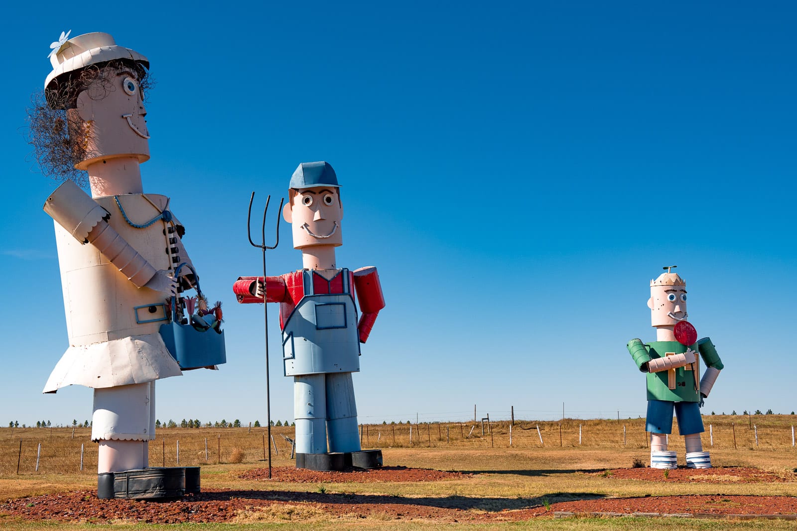 This is an overview of the characters in the sculpture by Gary Greff called The Tin Family. It is located along the Enchanted Highway running between I-94 and Regent, North Dakota.