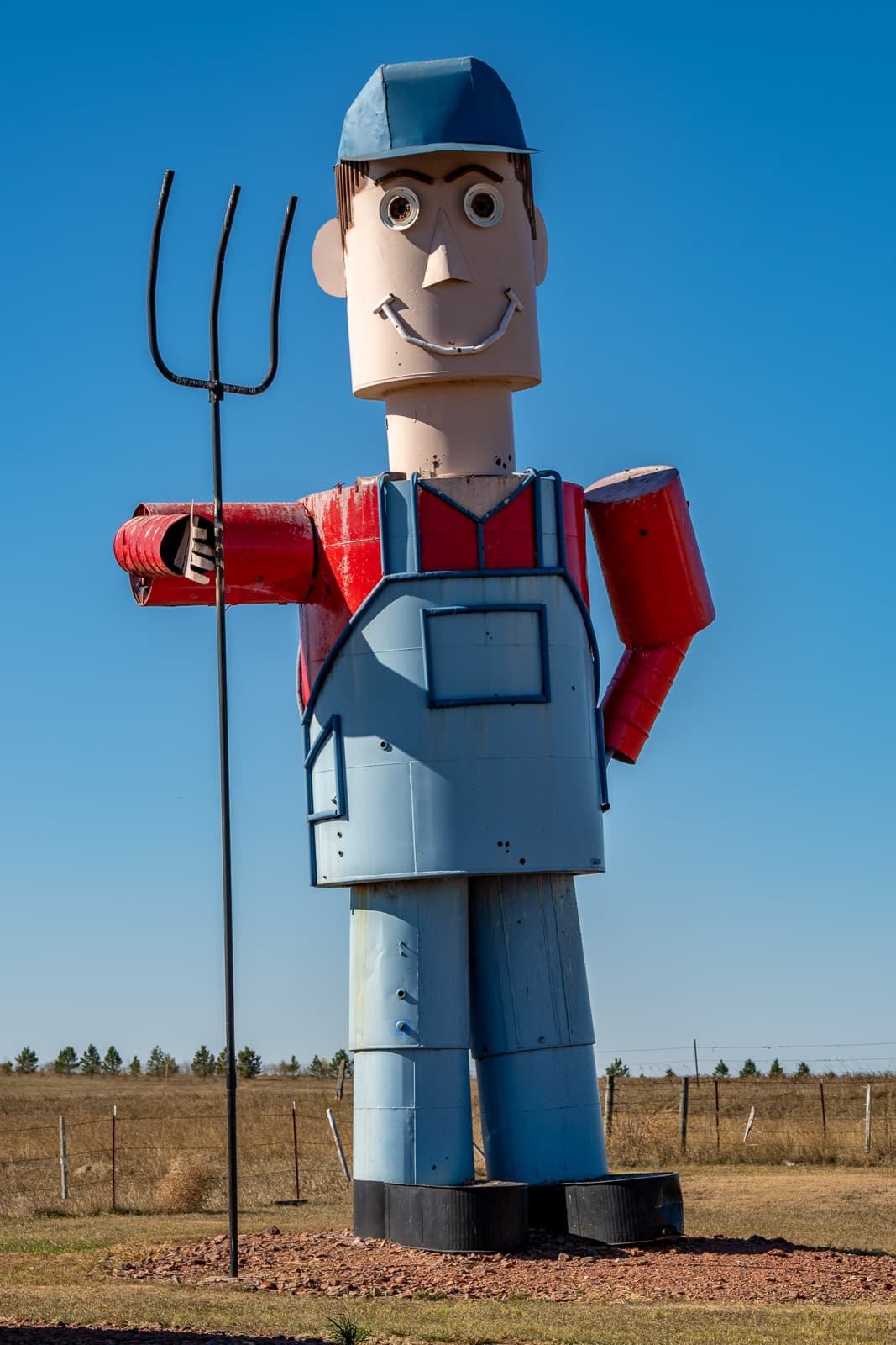 This is a head-to-toe view of the father figure in the sculpture by Gary Greff called The Tin Family. It is located along the Enchanted Highway running between I-94 and Regent, North Dakota.