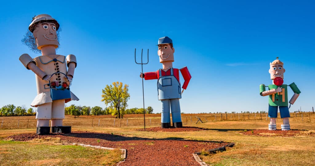 This is an straight-on view of the characters in the sculpture by Gary Greff called The Tin Family. It is located along the Enchanted Highway running between I-94 and Regent, North Dakota.