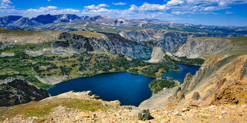 Looking down into the blue waters of Twin Lakes from near the Beartooth Pass Overlook