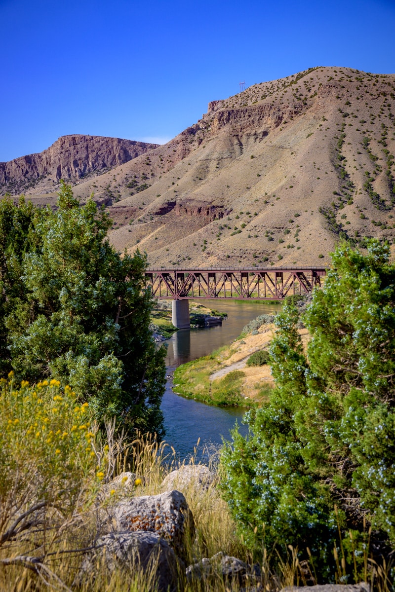 View of the Wind River Canyon Railroad Bridge taken from a curve at the north end of US 20.