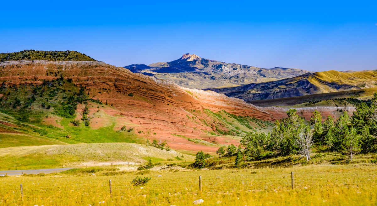 The Bright Red Beds of the Triassic Chugwater Formation are overlain by Gypsum along the Chief Joseph Scenic Byway.