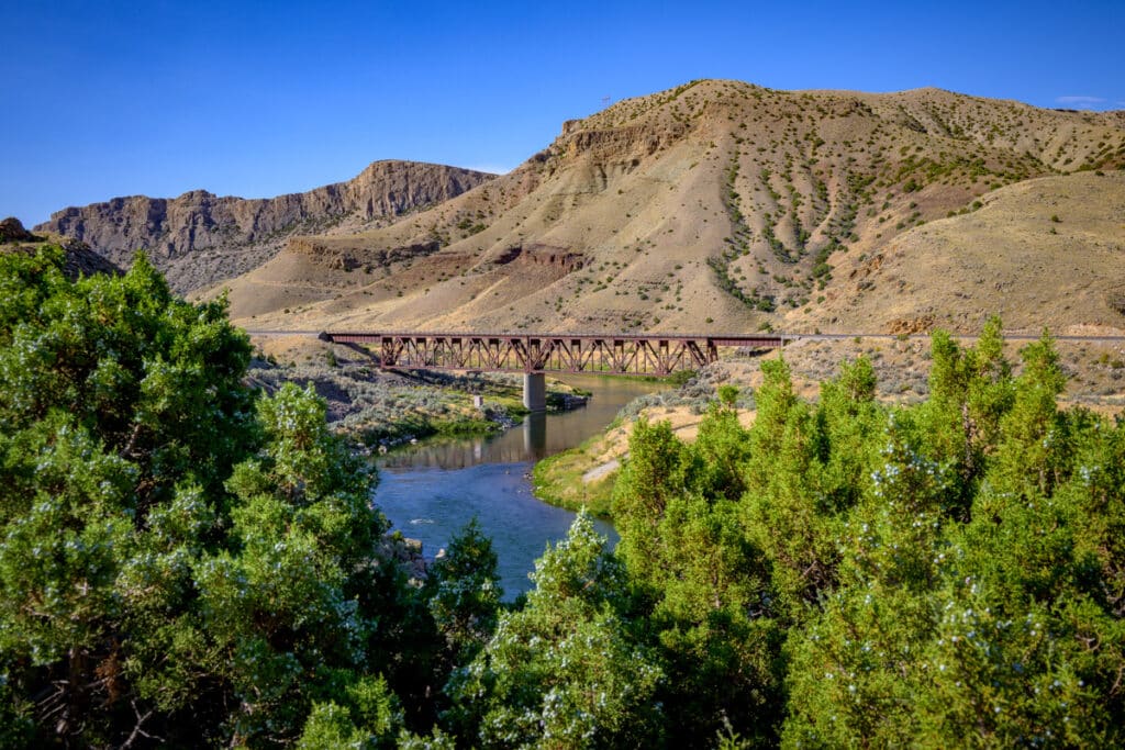 View of the BNSF Wind River Canyon Railroad Bridge taken from a curve at the north end of US 20.